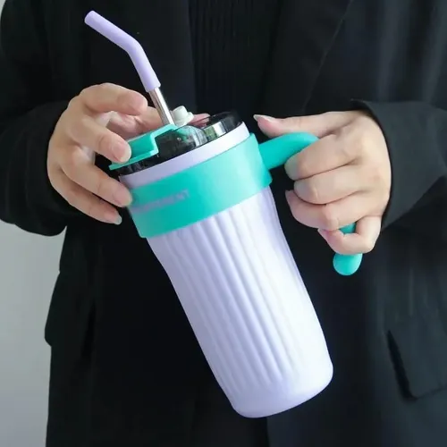 40oz-insulated-travel-mug-with-hand_1208_7yc0.webp